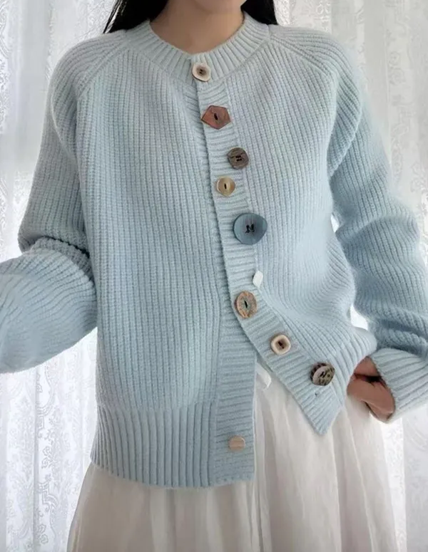 Elegant and comfortable cardigan made from soft-touch material with multicolored buttons