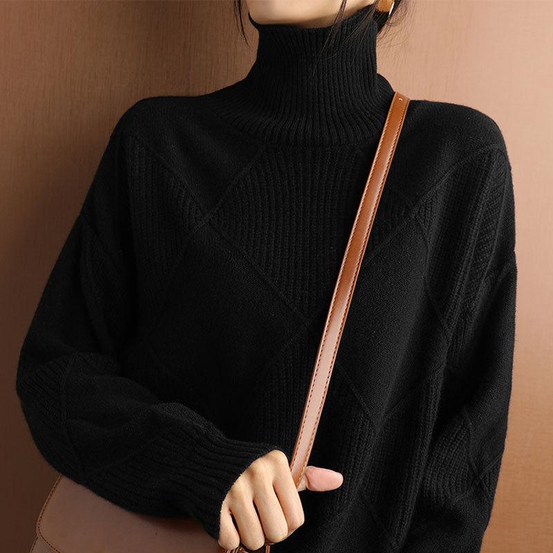 Elegant loose-knit sweater with a neckline