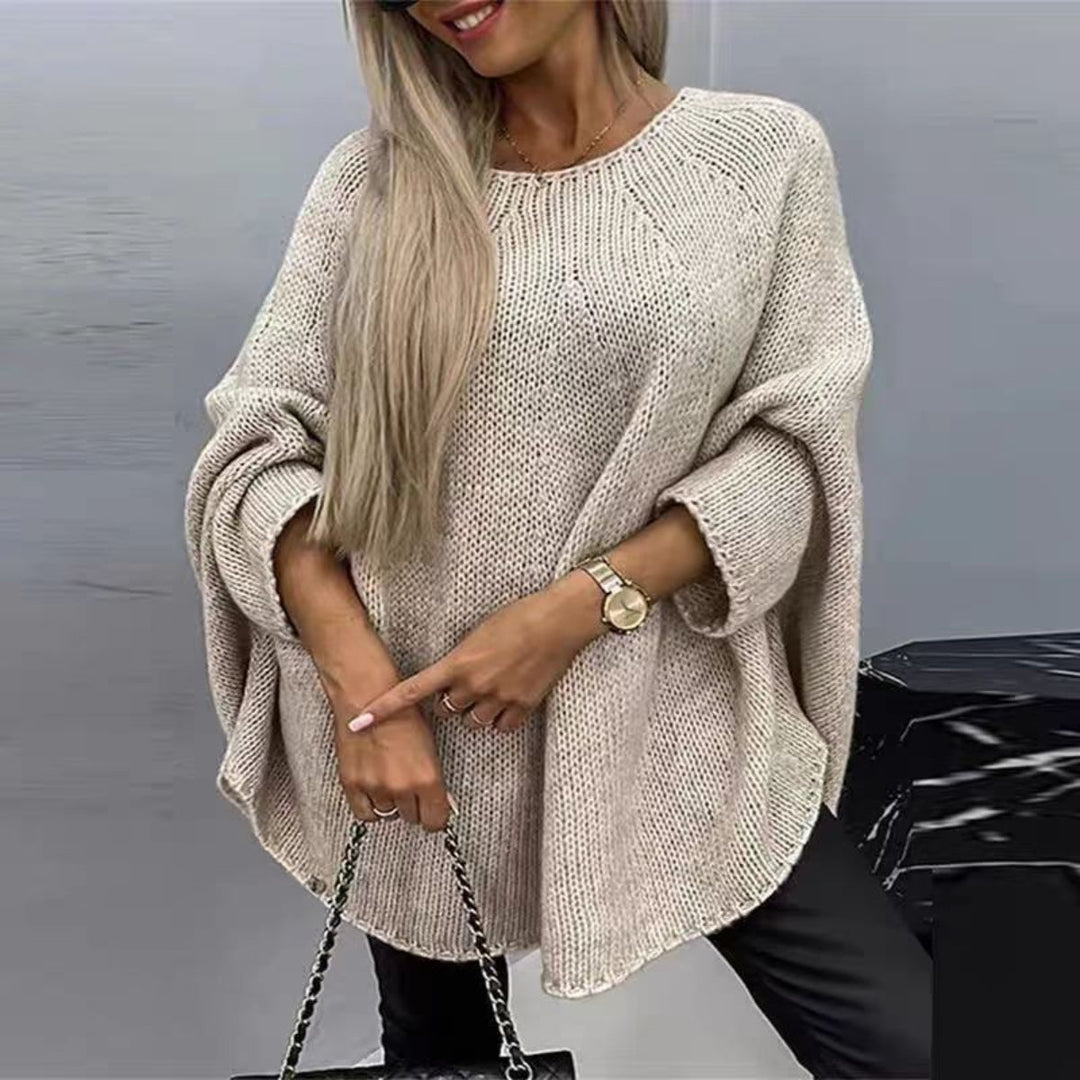 Stylish and versatile cape-style knit sweater