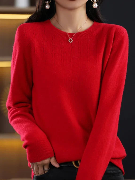 Loose solid color sweater with a round neckline