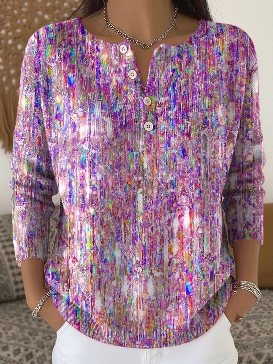 Elegant and comfortable sweater in purple mélange with a slightly open neckline and button closure