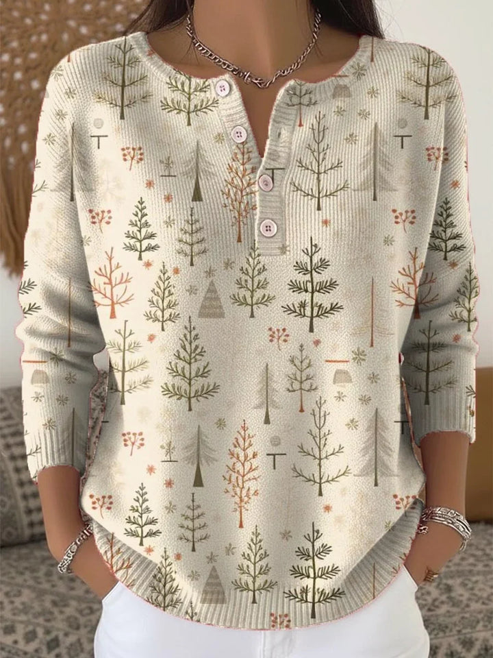 Elegant and comfortable light beige sweater with a fresh and stylish tree pattern and decorative buttons at the neckline