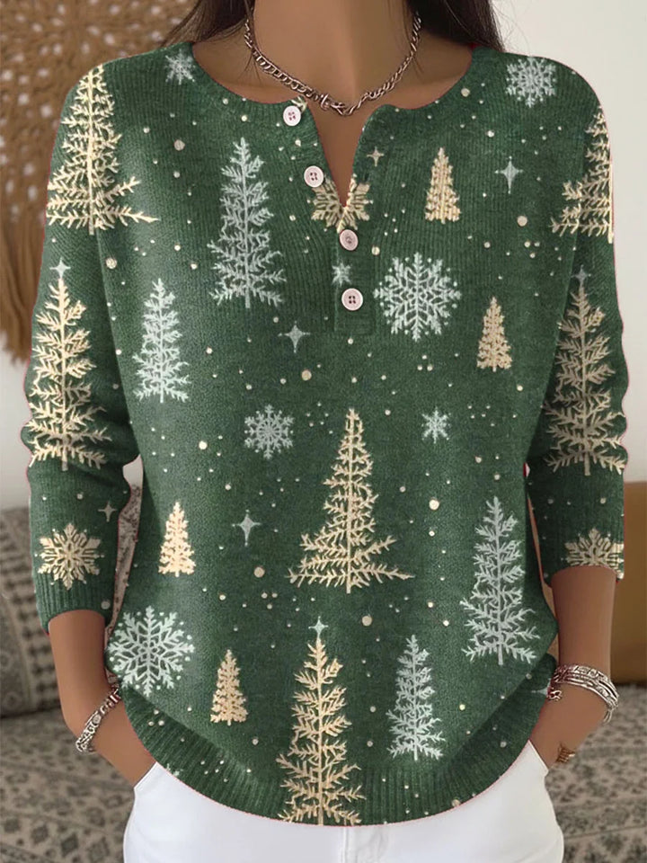 Elegant and cozy dark green sweater with a pattern featuring a Christmas tree and snowflakes, along with decorative buttons at the neckline