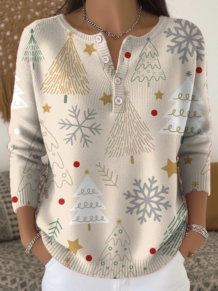 Elegant and cozy beige sweater with a Christmas tree and snowflake motif and decorative buttons at the neckline