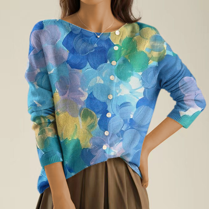 Elegant and Comfortable Sweater with Blue Abstract Pattern and Irregular Buttons