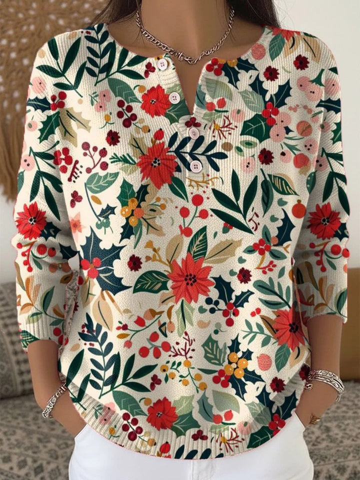 Elegant and comfortable sweater with a beautiful floral pattern and buttons at the neckline