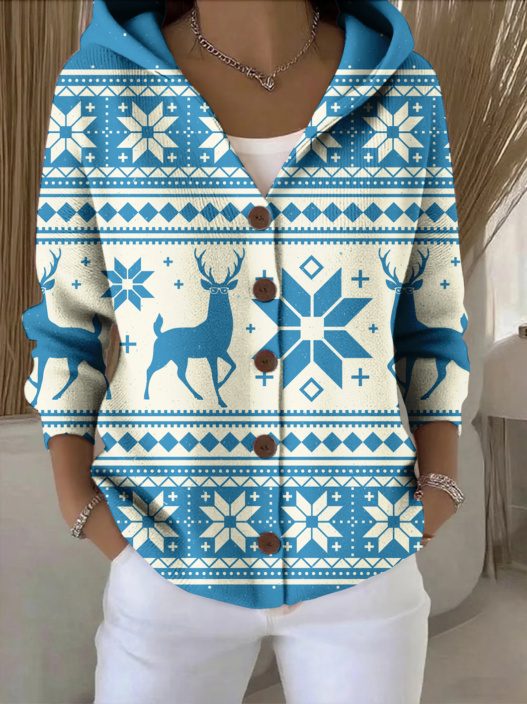 Elegant and comfortable blue cardigan with a hood in a festive pattern, perfect for everyday wear