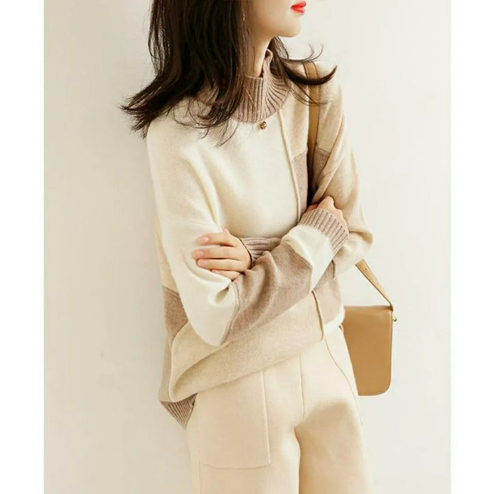 Cashmere sweater with a turtleneck in geometric color blocks