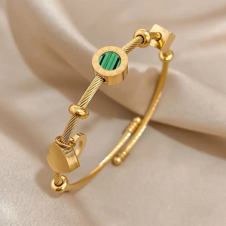 Gold Band with a Green Gemstone
