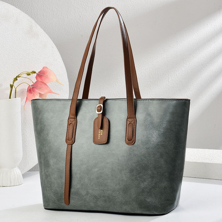 Refined Whisper Handbag