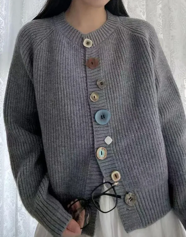 Elegant and comfortable cardigan made from soft-touch material with multicolored buttons