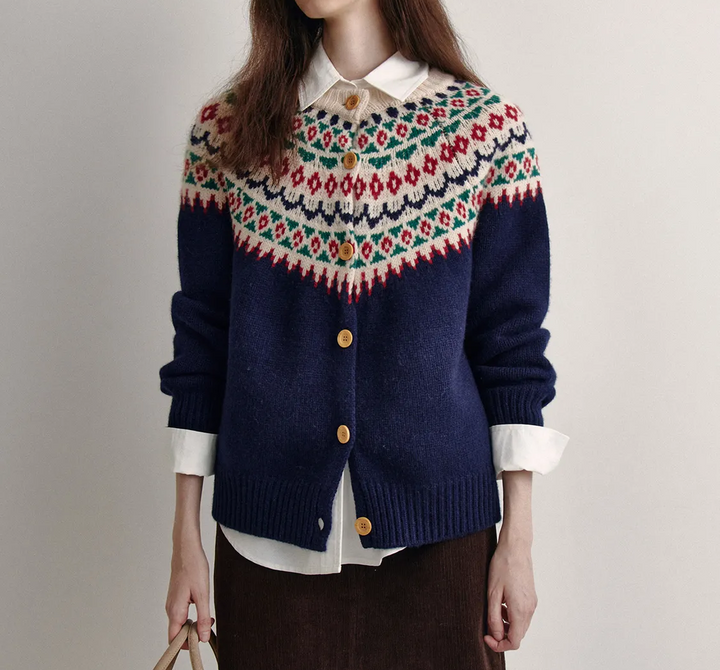 Loose and comfortable blue cardigan with a retro geometric pattern and button closure
