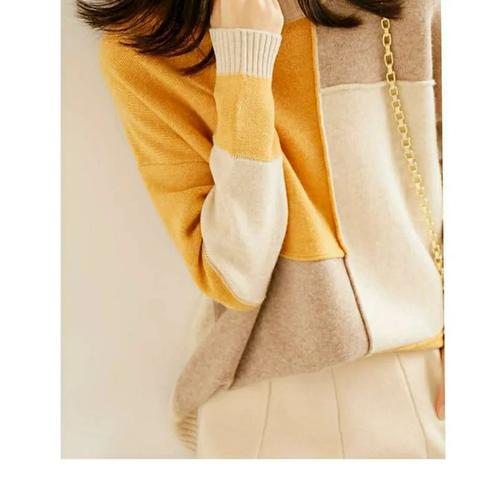 Cashmere sweater with a turtleneck in geometric color blocks