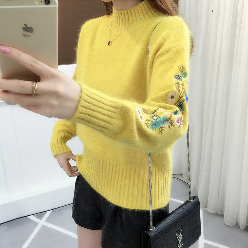 Warm knitted sweater in solid color