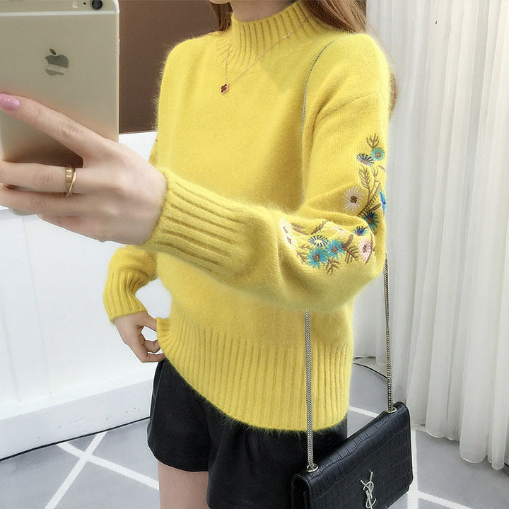Warm knitted sweater in solid color