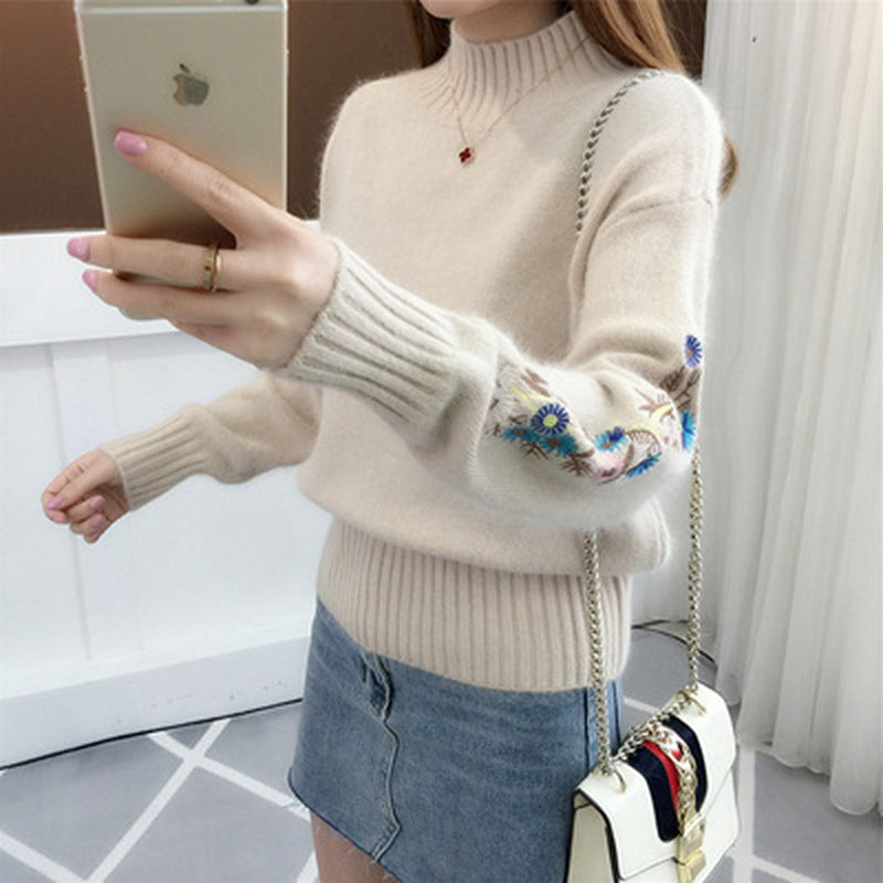Warm knitted sweater in solid color