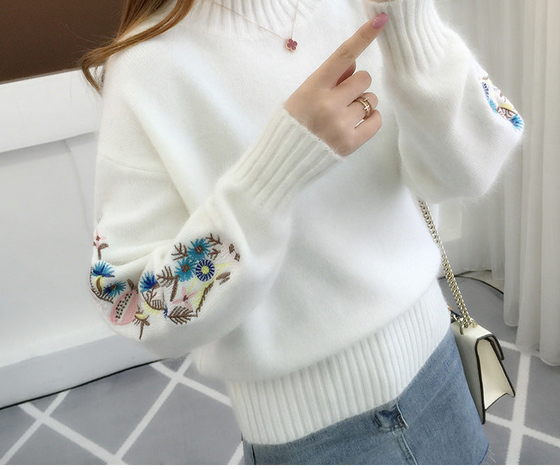 Warm knitted sweater in solid color