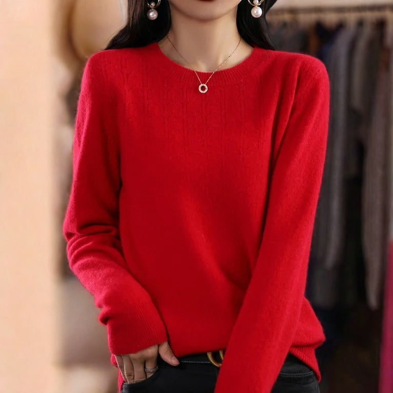 Loose solid color sweater with a round neckline