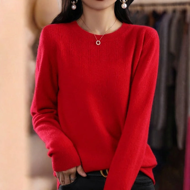 Loose solid color sweater with a round neckline