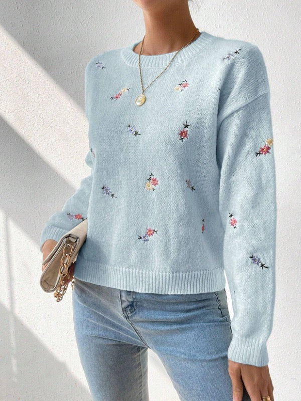 Elegant and comfortable sweater with a round neckline and floral pattern, soft to the touch, versatile and cozy