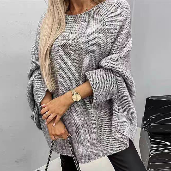 Stylish and versatile cape-style knit sweater