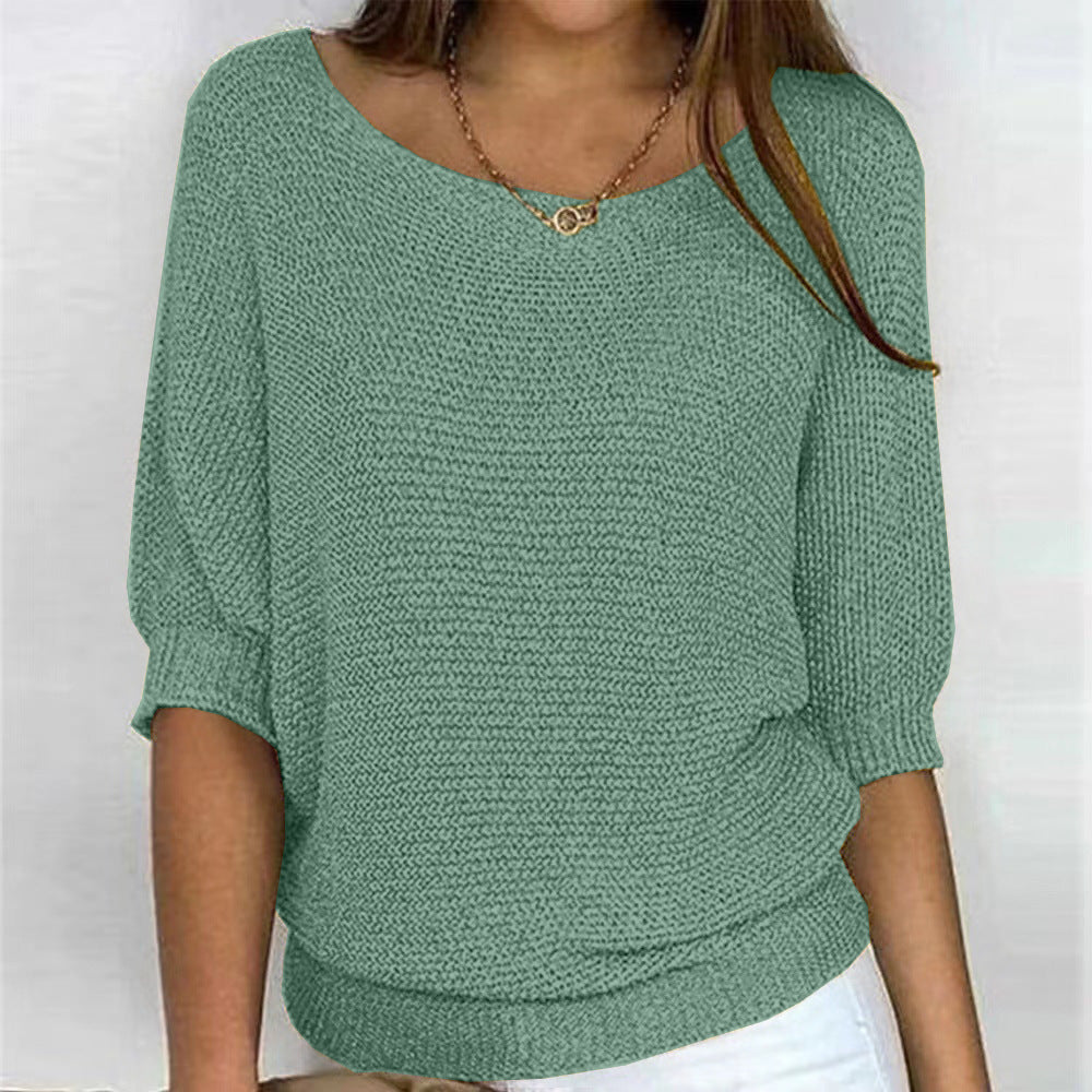 Women's solid color sweater, loose, with three-quarter sleeves
