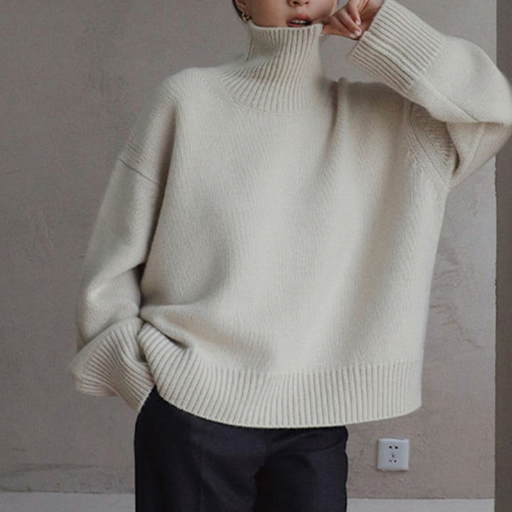Women's loose and elegant sweater with a mock turtleneck, in a solid color, for everyday wear