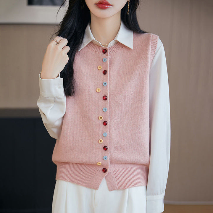 Elegant and comfortable sleeveless sweater with multicolored buttons