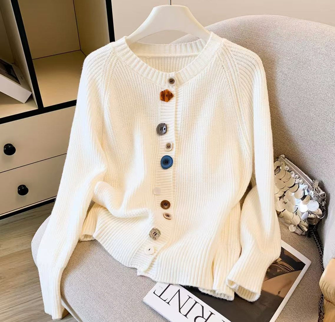 Elegant and comfortable cardigan made from soft-touch material with multicolored buttons