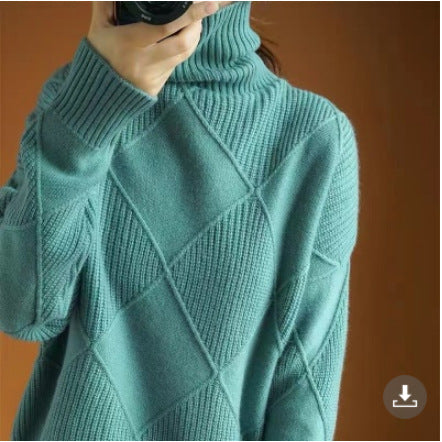Elegant loose-knit sweater with a neckline