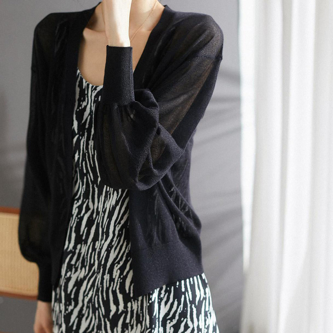 Elegant and comfortable, lightweight, breathable women's cardigan in solid color with a V-neck and buttons