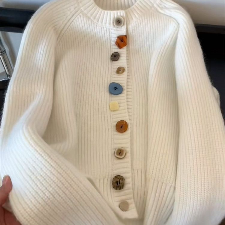 Elegant and comfortable cardigan made from soft-touch material with multicolored buttons