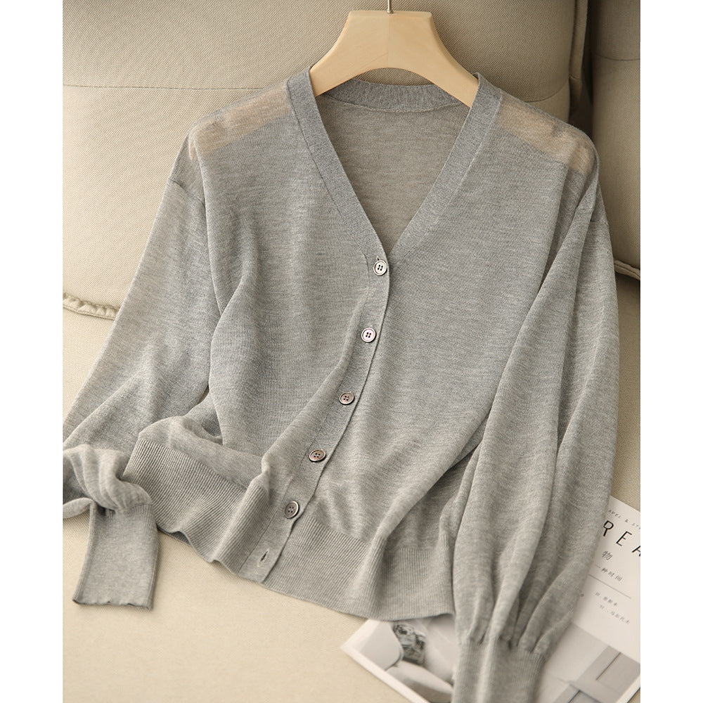 Elegant and comfortable, lightweight, breathable women's cardigan in solid color with a V-neck and buttons
