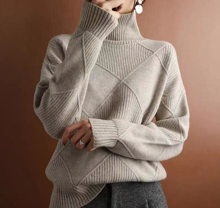 Elegant loose-knit sweater with a neckline