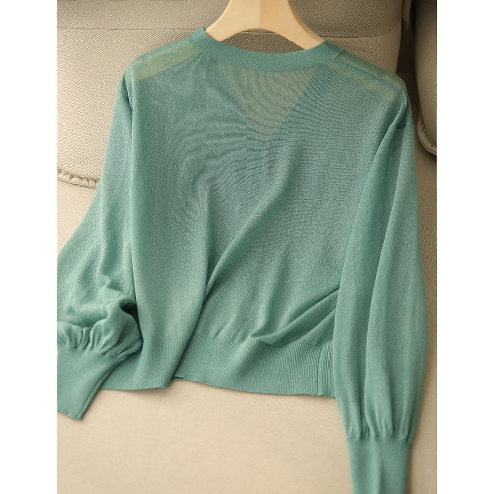 Elegant and comfortable, lightweight, breathable women's cardigan in solid color with a V-neck and buttons