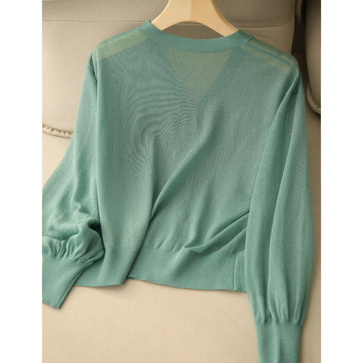 Elegant and comfortable, lightweight, breathable women's cardigan in solid color with a V-neck and buttons