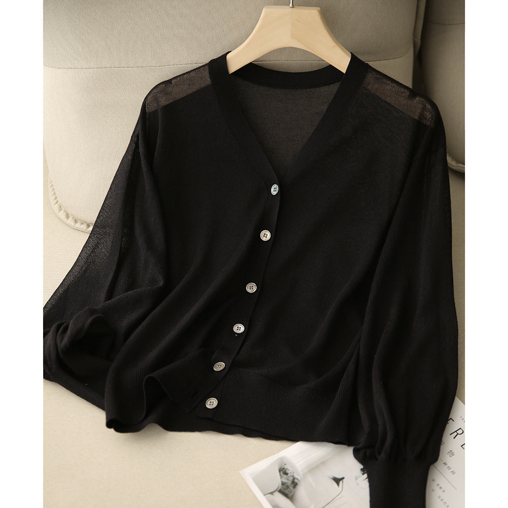 Elegant and comfortable, lightweight, breathable women's cardigan in solid color with a V-neck and buttons