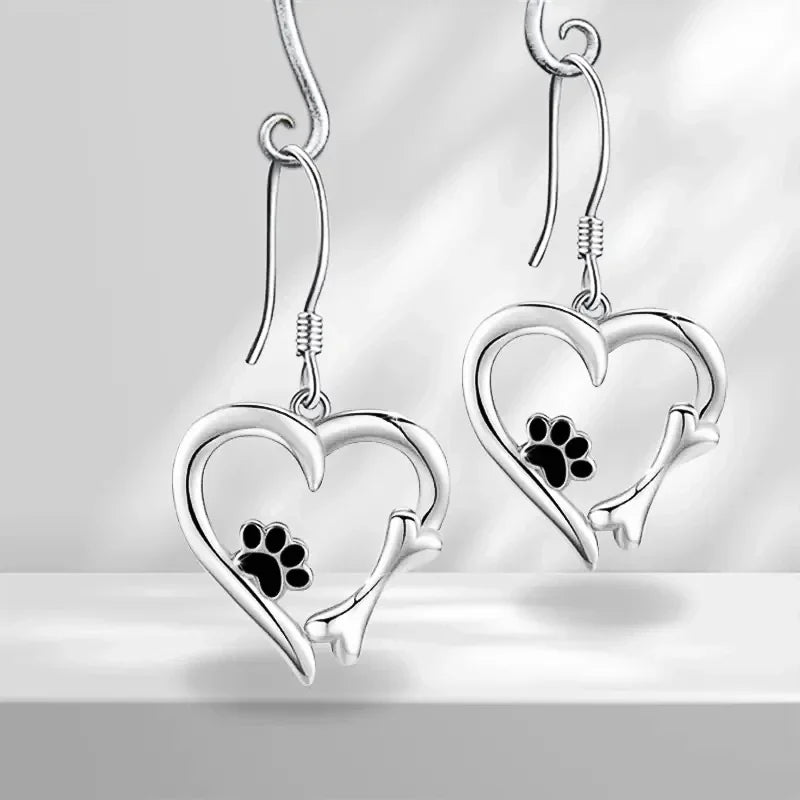 Heart-shaped dangling earrings with paw print – Playful silver jewelry