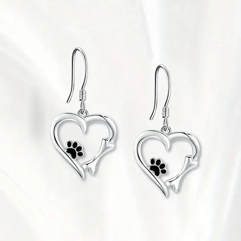 Heart-shaped dangling earrings with paw print – Playful silver jewelry