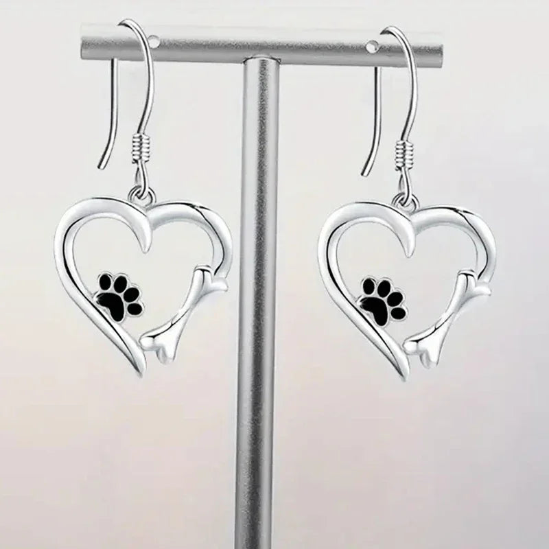 Heart-shaped dangling earrings with paw print – Playful silver jewelry
