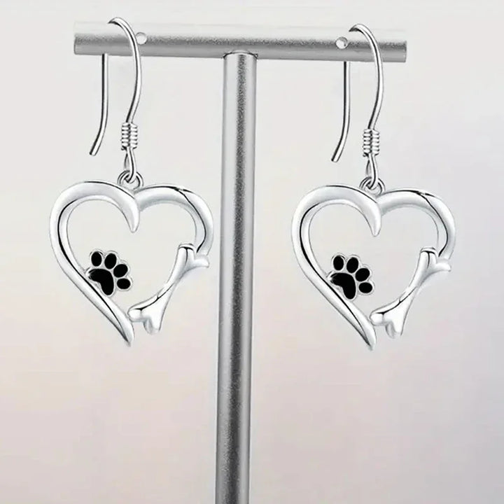 Heart-shaped dangling earrings with paw print – Playful silver jewelry