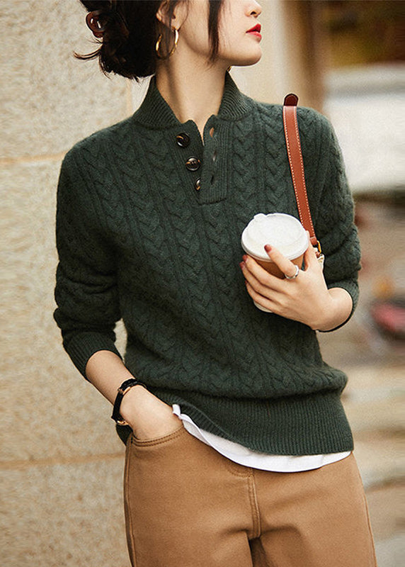 Simple and comfortable women's sweater made of thick knit, in a solid color, with a stand-up collar and buttons