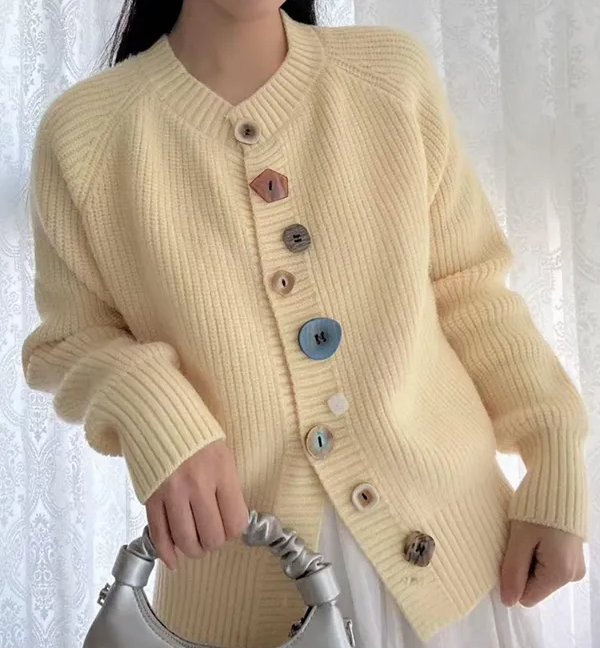 Elegant and comfortable cardigan made from soft-touch material with multicolored buttons