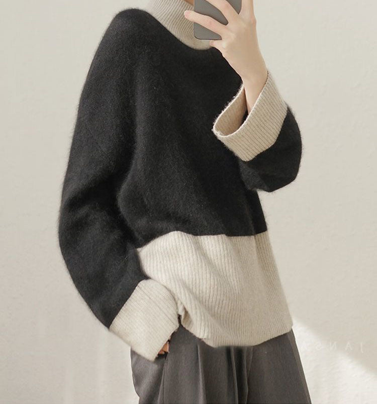 Elegant and beautiful two-tone cashmere turtleneck sweater in color blocks