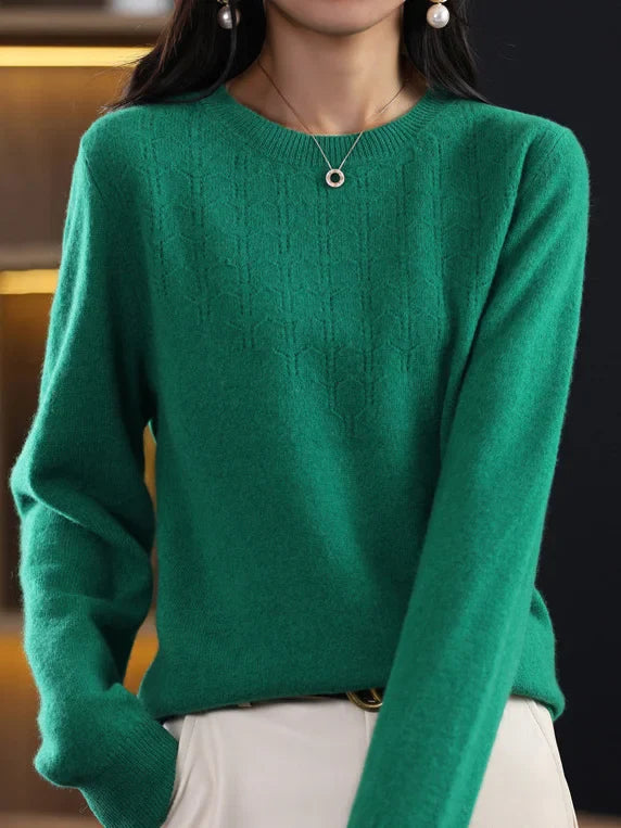 Loose solid color sweater with a round neckline
