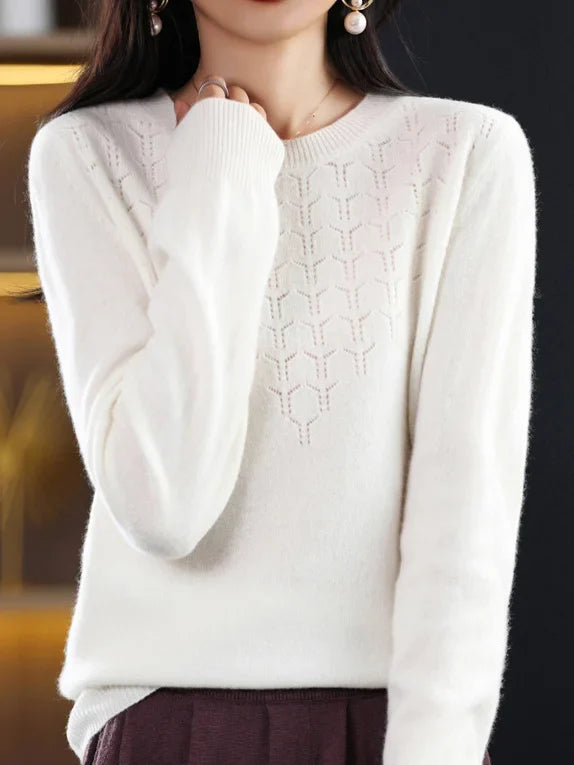 Loose solid color sweater with a round neckline