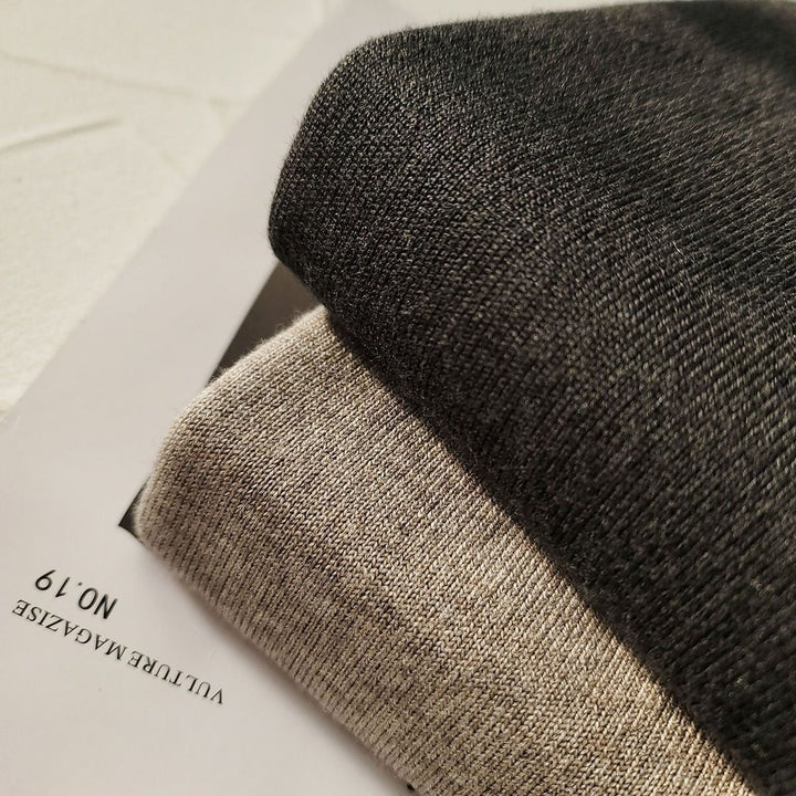 Elegant and comfortable retro-style cardigan in a solid color, soft as a cloud