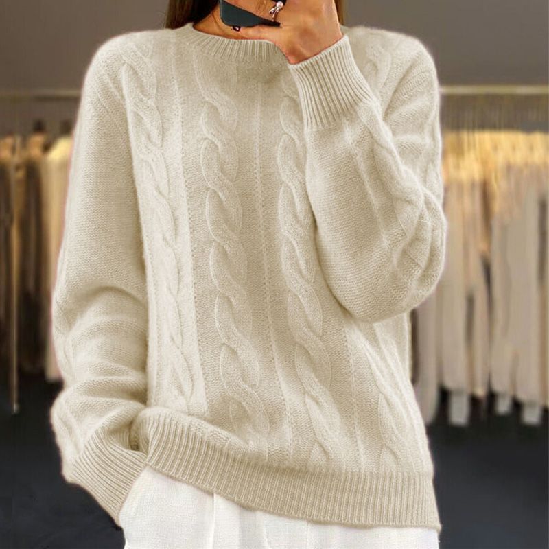 Warm, knitted sweater in solid color with a round neckline