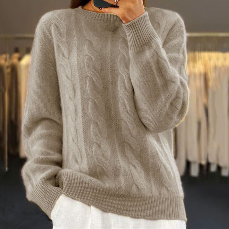 Warm, knitted sweater in solid color with a round neckline