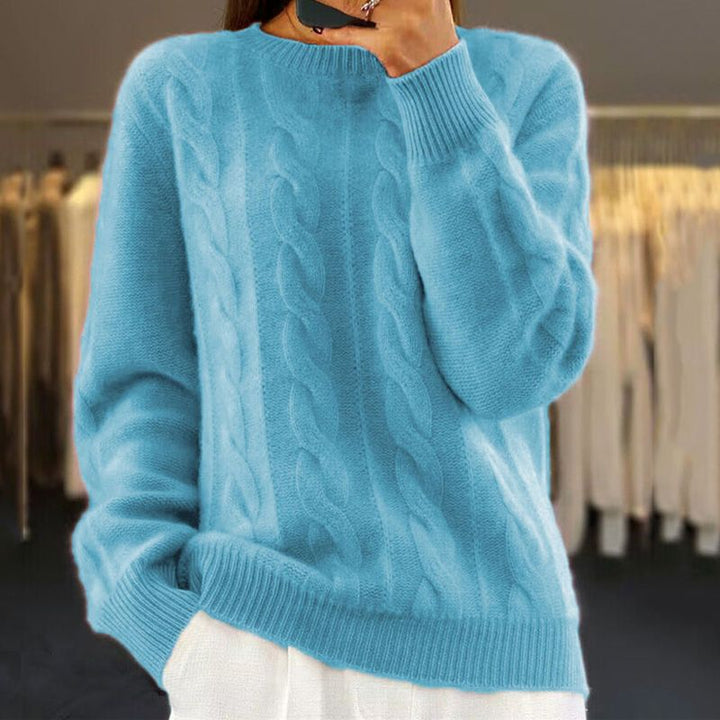 Warm, knitted sweater in solid color with a round neckline